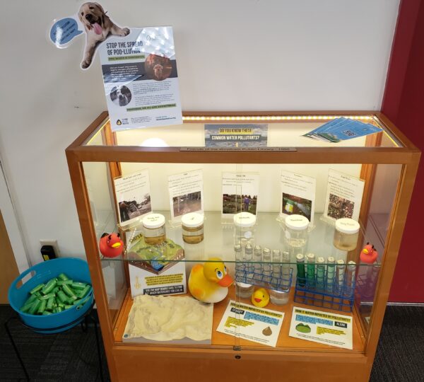 Display case with exhibit of water pollutants